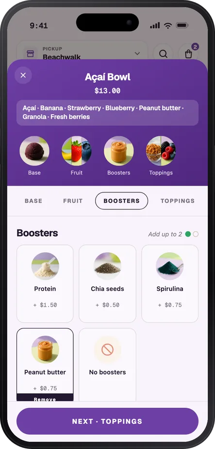 Building an Açaí Bowl in a smoothie brand’s app — photo option cards, a live recipe summary, and the price updating as boosters are added, with the bag already holding an item